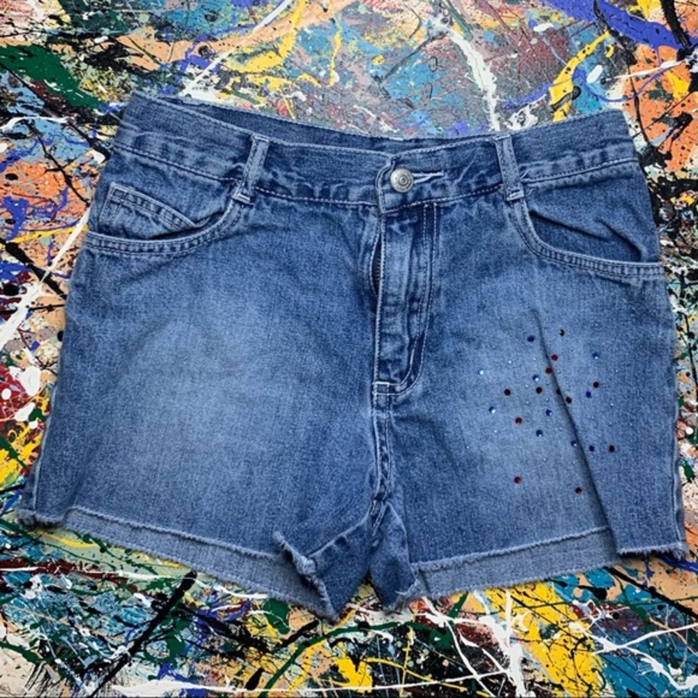 THE CHILDREN’S PLACE blue denim “cut-off” shorts.